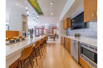 Mingle lounge with gaming area, hdtv, and ample comfortable seating